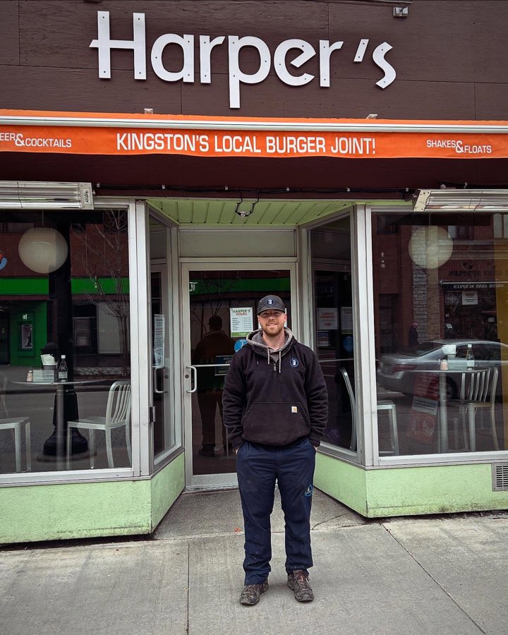 Brock outside Harper's Burger Bar in downtown Kingston
