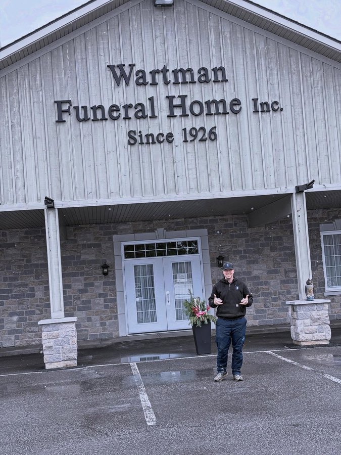 Brock outside Wartman Funeral Home, established 1926